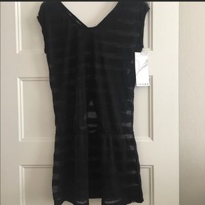 Oakley swimsuit cover. NWT. Size small.